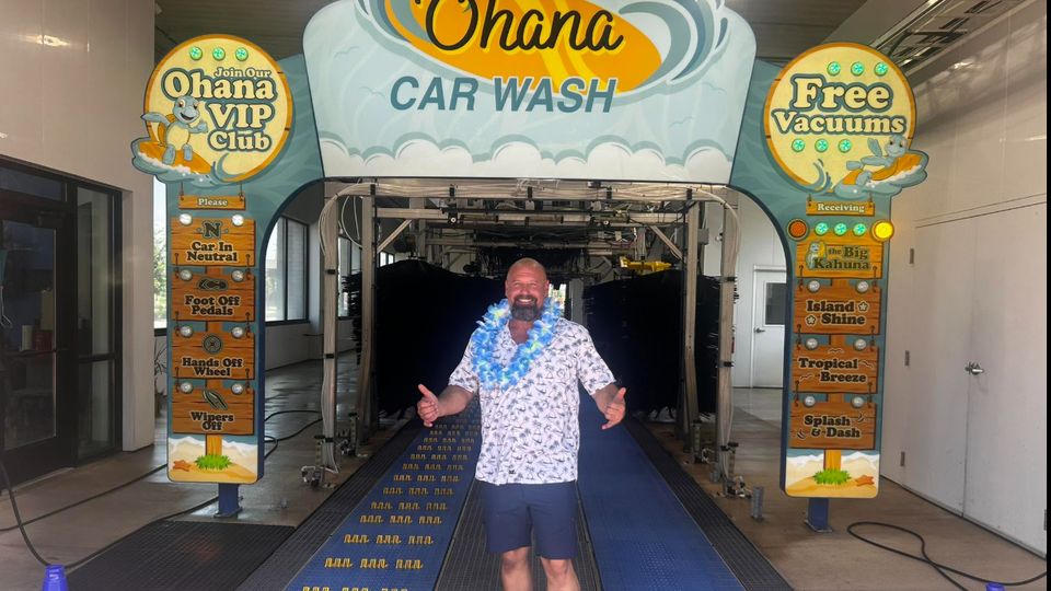 Nick, owner of Ohana Car Wash, welcoming guests at the tunnel entrance